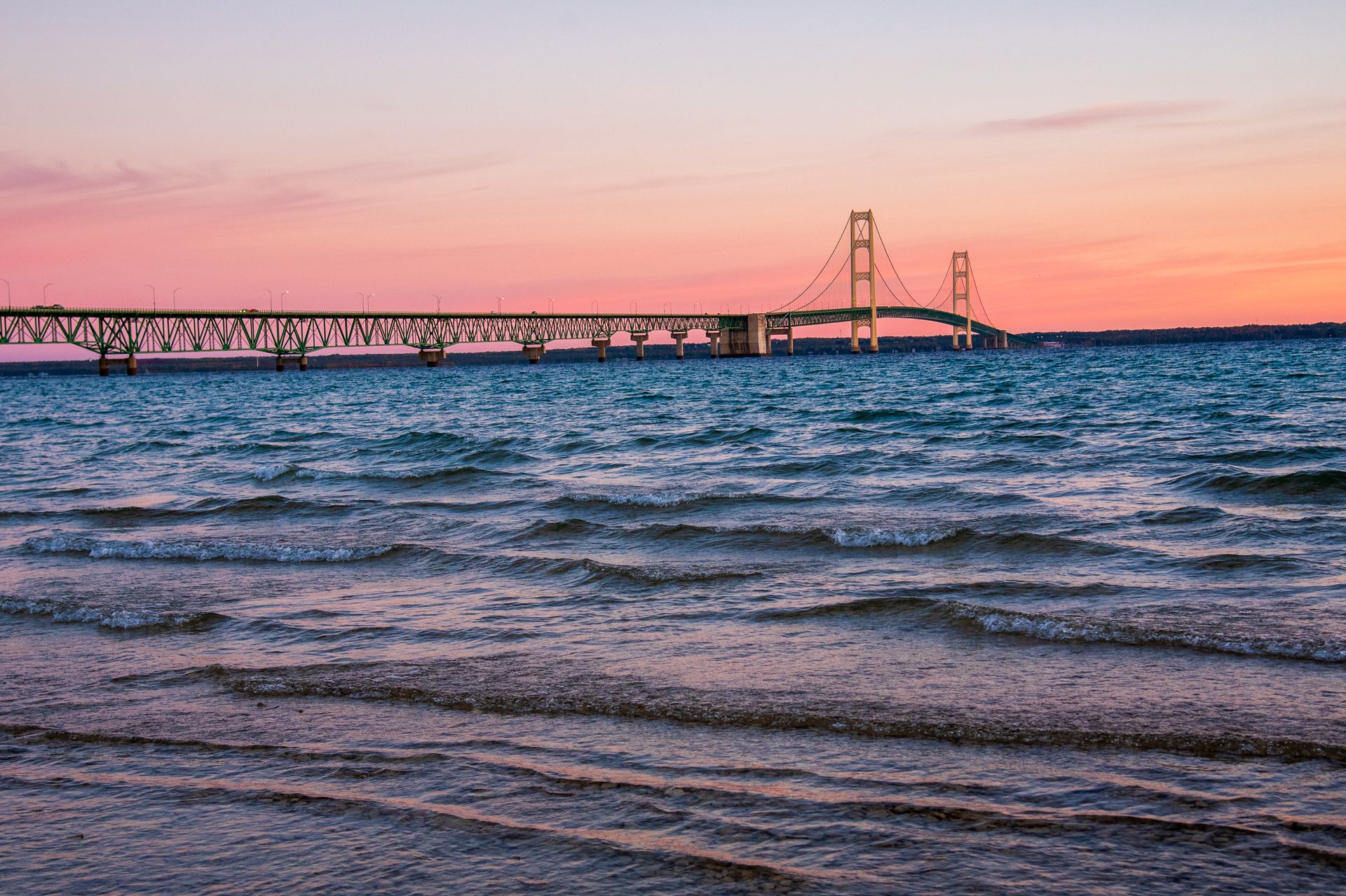 The Mackinac Bridge stretching across the water in Michigan